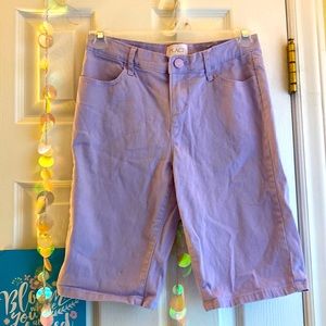 Children place purple shorts